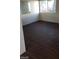 A room with dark wood floors at 4770 Topaz St # 79, Las Vegas, NV 89121