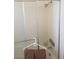 Clean shower and tub combination with sliding glass door, tiled walls, and updated fixture at 4770 Topaz St # 79, Las Vegas, NV 89121