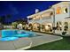 Inviting backyard oasis features a sparkling pool and outdoor living space at 5030 Spanish Hills Dr, Las Vegas, NV 89148