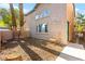 Exterior view of the property, showcasing a backyard with minimal, low maintenance landscaping at 5615 Calais Ct, Las Vegas, NV 89118