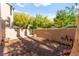 A view of the backyard featuring minimal landscaping and an updated backyard wall at 5615 Calais Ct, Las Vegas, NV 89118
