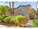 Charming townhome featuring desert landscaping, a private entrance, and a tranquil setting at 5615 Calais Ct, Las Vegas, NV 89118