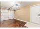 Attached garage featuring a new epoxy floor and a modern insulated door at 5615 Calais Ct, Las Vegas, NV 89118
