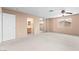 Large carpeted main bedroom with natural light, closet and ensuite bathroom access at 5615 Calais Ct, Las Vegas, NV 89118