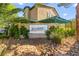 Community signage with decorative landscaping at the Souvenir community entrance at 5615 Calais Ct, Las Vegas, NV 89118