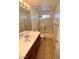 Bathroom with tile floors, shower and vanity at 5653 Mount Athos St, North Las Vegas, NV 89031