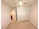 Bedroom with carpet flooring and closet at 5653 Mount Athos St, North Las Vegas, NV 89031