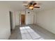 Bedroom with carpeted flooring, closet, and natural light at 5653 Mount Athos St, North Las Vegas, NV 89031