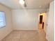 Bright bedroom featuring carpeted floor and natural light from the window at 5653 Mount Athos St, North Las Vegas, NV 89031