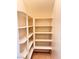Walk-in pantry with built-in shelving for organized storage at 5653 Mount Athos St, North Las Vegas, NV 89031