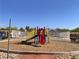 Fun playground area in community with slide at 5653 Mount Athos St, North Las Vegas, NV 89031