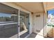 Enclosed balcony with storage and sliding glass doors providing natural light and outdoor access at 5710 E Tropicana Ave # 2152, Las Vegas, NV 89122
