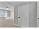 Sunny bedroom featuring a large window, neutral color scheme, and carpeted floors at 5710 E Tropicana Ave # 2152, Las Vegas, NV 89122