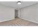 Neutral bedroom featuring carpet and closets with entry to another room at 5710 E Tropicana Ave # 2152, Las Vegas, NV 89122