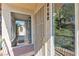 Inviting condo entrance with security door and clear view into the home with ample light at 5710 E Tropicana Ave # 2152, Las Vegas, NV 89122