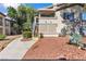 Inviting two-story condo with manicured landscaping, showcasing the charming exterior and unit numbers at 5710 E Tropicana Ave # 2152, Las Vegas, NV 89122