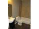Bathroom featuring a tiled shower-tub combo, modern vanity, and toilet at 574 Roxella Ln # C, Las Vegas, NV 89110