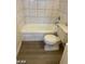 Full bathroom featuring a shower over the bathtub, tile surround, and neutral-colored flooring at 615 S Royal Crest Cir # 10, Las Vegas, NV 89169