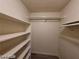 A view of a closet featuring shelving and storage at 615 S Royal Crest Cir # 10, Las Vegas, NV 89169