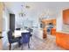 Bright dining area features stylish chairs, pendant lights, and easy access to the kitchen at 6233 Overhang Ave, Henderson, NV 89011