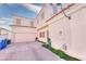 Attached garage offers parking and storage solutions plus extra space at the side of the house at 6233 Overhang Ave, Henderson, NV 89011