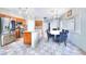 Spacious kitchen with modern appliances, an island counter, and a dining area for casual meals at 6233 Overhang Ave, Henderson, NV 89011