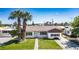 Charming single-story home with a well-maintained lawn and mature palm trees in a desirable neighborhood at 633 5Th St, Boulder City, NV 89005