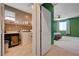 Convenient laundry room with modern appliances and ample storage space, located next to the bedroom at 6334 Orions Belt Peak St, North Las Vegas, NV 89031