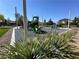 Community playground featuring modern equipment, surrounded by well-maintained landscaping at 6334 Orions Belt Peak St, North Las Vegas, NV 89031
