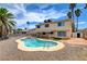Backyard view of the house and pool. Perfect for entertaining and relaxation at 7004 Powderhorn Cir, Las Vegas, NV 89128