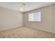 Standard bedroom with a large window and neutral carpet at 7004 Powderhorn Cir, Las Vegas, NV 89128