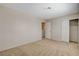 Bedroom featuring neutral walls, carpet, a closet and an open doorway to the bathroom at 7004 Powderhorn Cir, Las Vegas, NV 89128