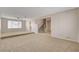 Spacious living room with staircase access to the second level at 7004 Powderhorn Cir, Las Vegas, NV 89128