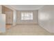 Cozy living room with neutral carpet and natural light at 7004 Powderhorn Cir, Las Vegas, NV 89128