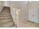Staircase and front entrance with tile flooring at 7004 Powderhorn Cir, Las Vegas, NV 89128