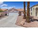 Charming single-story home with a well-maintained front yard and a two-car garage at 8316 Joseph Cary Ct, Las Vegas, NV 89145