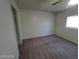 Standard bedroom with carpet flooring, neutral colored paint and a window at 854 Stainglass Ln, Las Vegas, NV 89110