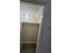 A standard walk-in closet featuring a hanging rod at 854 Stainglass Ln, Las Vegas, NV 89110