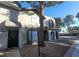 Inviting two-story townhome with well-maintained front yard and walkway at 854 Stainglass Ln, Las Vegas, NV 89110