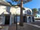 Charming townhouse featuring a unique architectural style and desert landscaping at 854 Stainglass Ln, Las Vegas, NV 89110