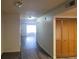Spacious hallway with sleek flooring and natural light, leading to various rooms at 854 Stainglass Ln, Las Vegas, NV 89110