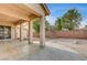 Covered back patio offers ample space for outdoor seating and entertaining guests at 9092 National Park Dr, Las Vegas, NV 89178