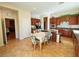 Bright and airy kitchen featuring a center island and dining area, adjacent to other living spaces at 9092 National Park Dr, Las Vegas, NV 89178