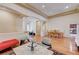 Spacious living area with elegant columns, hardwood floors, and ample lighting at 9092 National Park Dr, Las Vegas, NV 89178