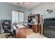 Comfortable home office setup with dual desk spaces and neutral color palette at 9092 National Park Dr, Las Vegas, NV 89178