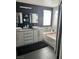 This stylish bathroom features dual vanities and a soaking tub at 9485 Supernova Ct, Las Vegas, NV 89123