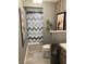 The bathroom features a modern vanity and stylish tile and tub at 9485 Supernova Ct, Las Vegas, NV 89123