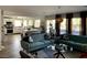 Open-concept living room with modern furnishings and view into the kitchen area at 9485 Supernova Ct, Las Vegas, NV 89123