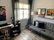 Versatile living space with futon, desk and stylish decor at 9485 Supernova Ct, Las Vegas, NV 89123