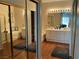 Luxurious bathroom featuring a large vanity with double sinks, a jacuzzi tub, and glass shower at 9753 Arrowcrest Ave, Las Vegas, NV 89147